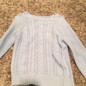light blue sweater